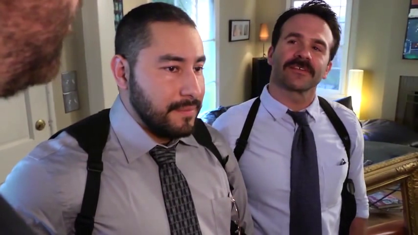 George on the set of Where The Bears Are as his character Detective Martinez