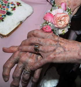 The couple show off their new wedding rings