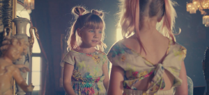 Willow Hart about to step through the looking glass in P!nk's new music video Just Like Fire