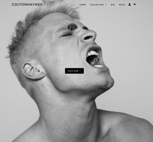 Colton Haynes website homepage with a picture of colton screaming in black and white
