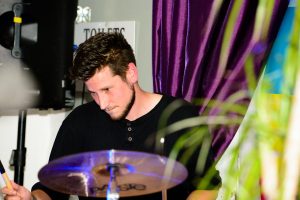 Sanj the drummer of the Stunt Lovers, an Irish band that has a trans lead singer