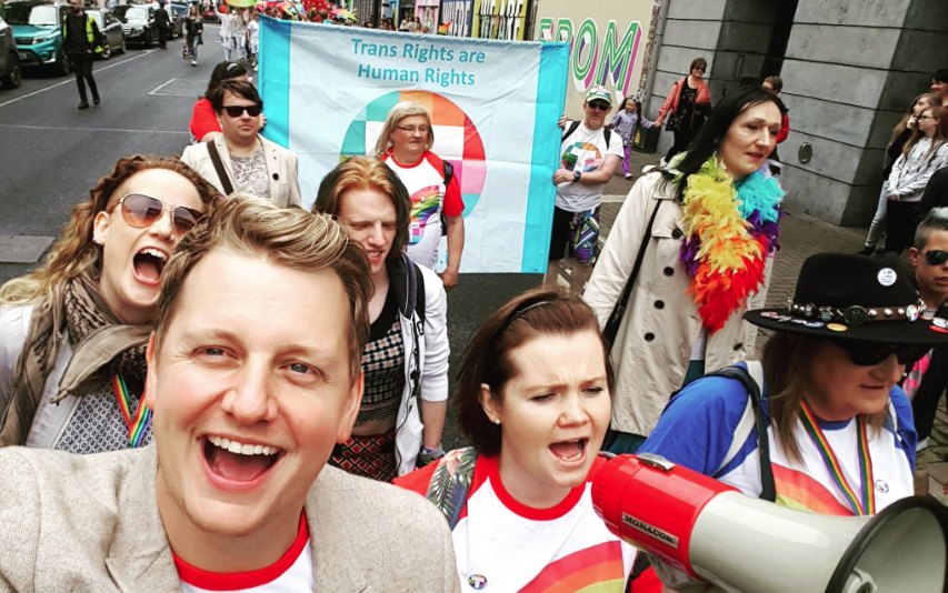 TENI staff marching in pride, TENI being one of the LGBT issues that Apple's €13b tax could help