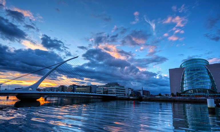 Dublin's river Liffey and Samuel Beckett bridge, indicative of Ireland one of the lgbt friendly places that the irish diaspora can return to