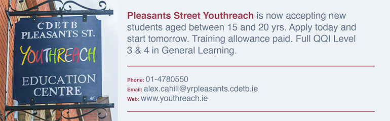 A photo of the pleasants st youth reach sign with text on the right