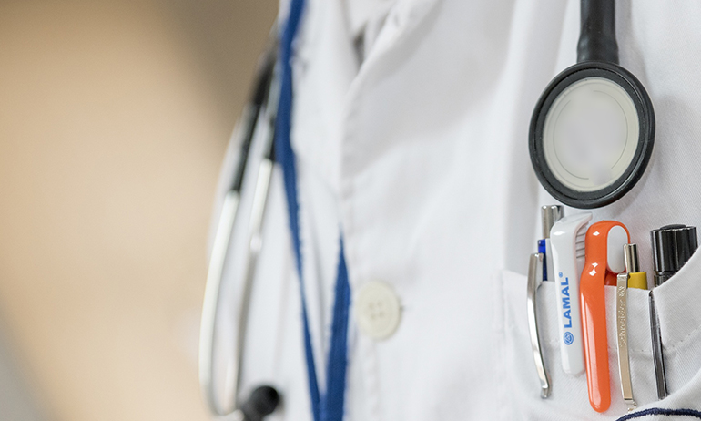 A doctor's jacket with stethoscope to symbolise the support you need to get in GCN's guide on where tof buy PrEP online