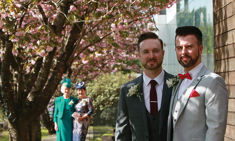 A same-sex couple for Real Weddings at the G Hotel venue
