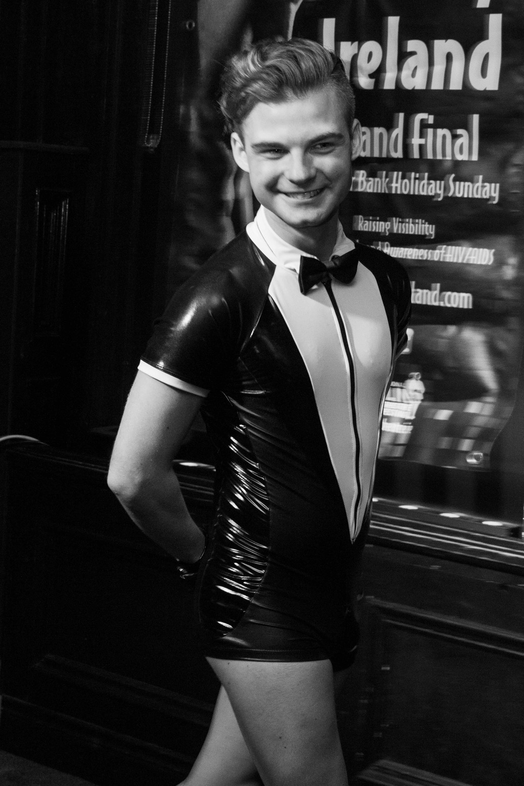Stephen Lehane in a latex tux as the winner of Mr Gay Ireland 2017 in black and white