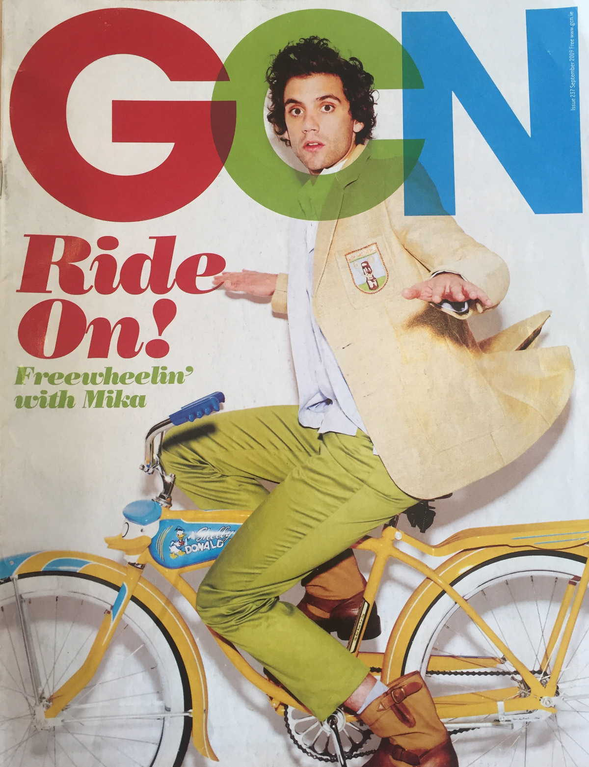The 2009 Issue in the Evolution of GCN, Ireland's National LGBT Publication with Mika on the cover in lime green pants on a bicycle