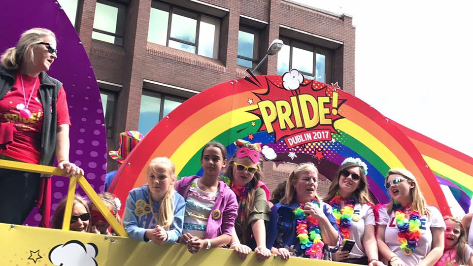 young women standing aboard a parade float at Dublin Pride 2017