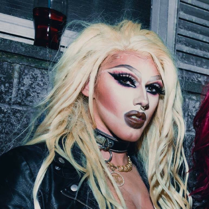 Drag performer Pixie posing for the camera