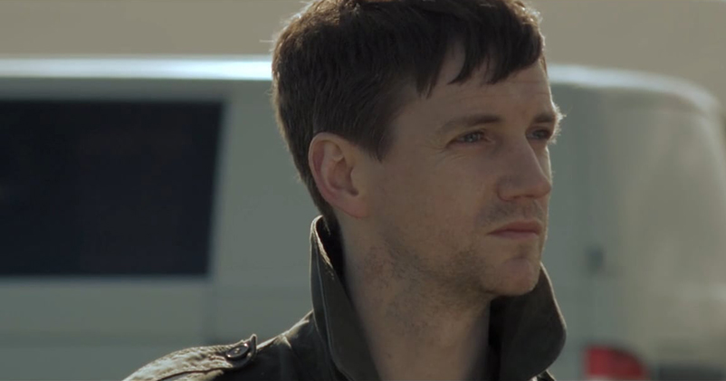 Close up of Irish playwright and actor Emmet Kirwan looking in the distance