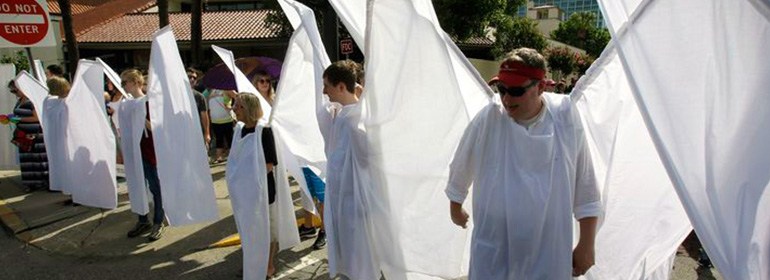 Angels block anti-gay signs from Westboro Baptist Church