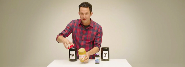 magician explains trans bathroom rights with peanut butter and jelly jars on a table