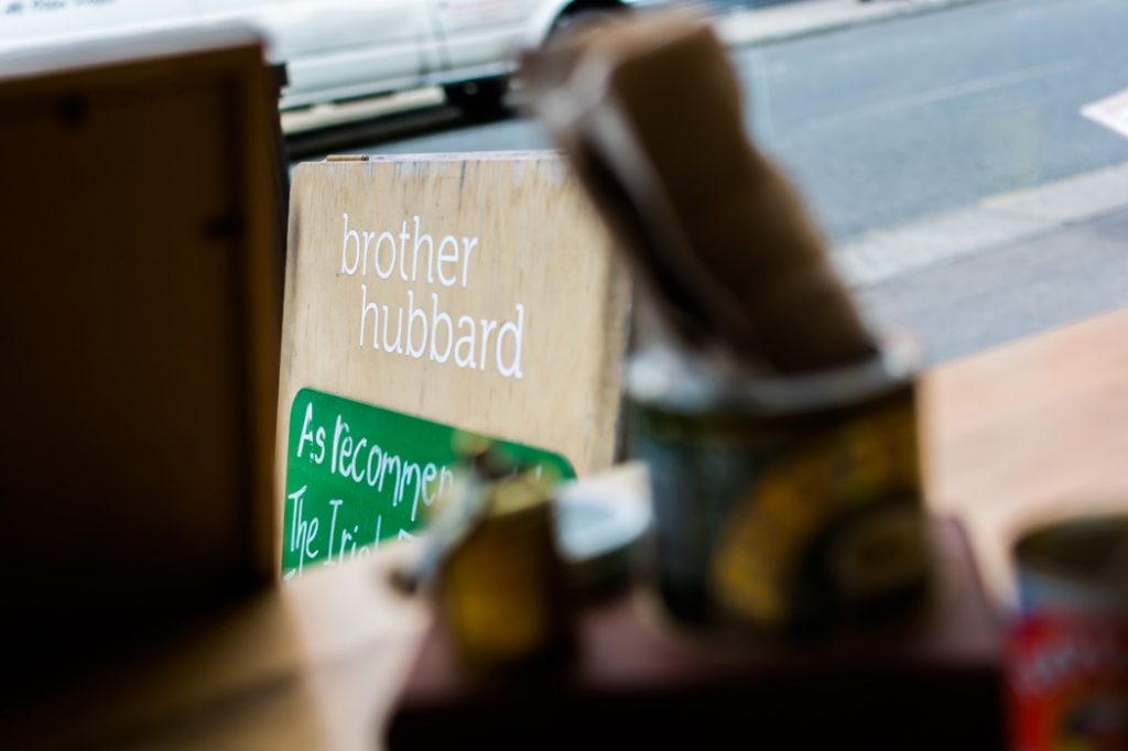 Brother hubbard - sign on the street