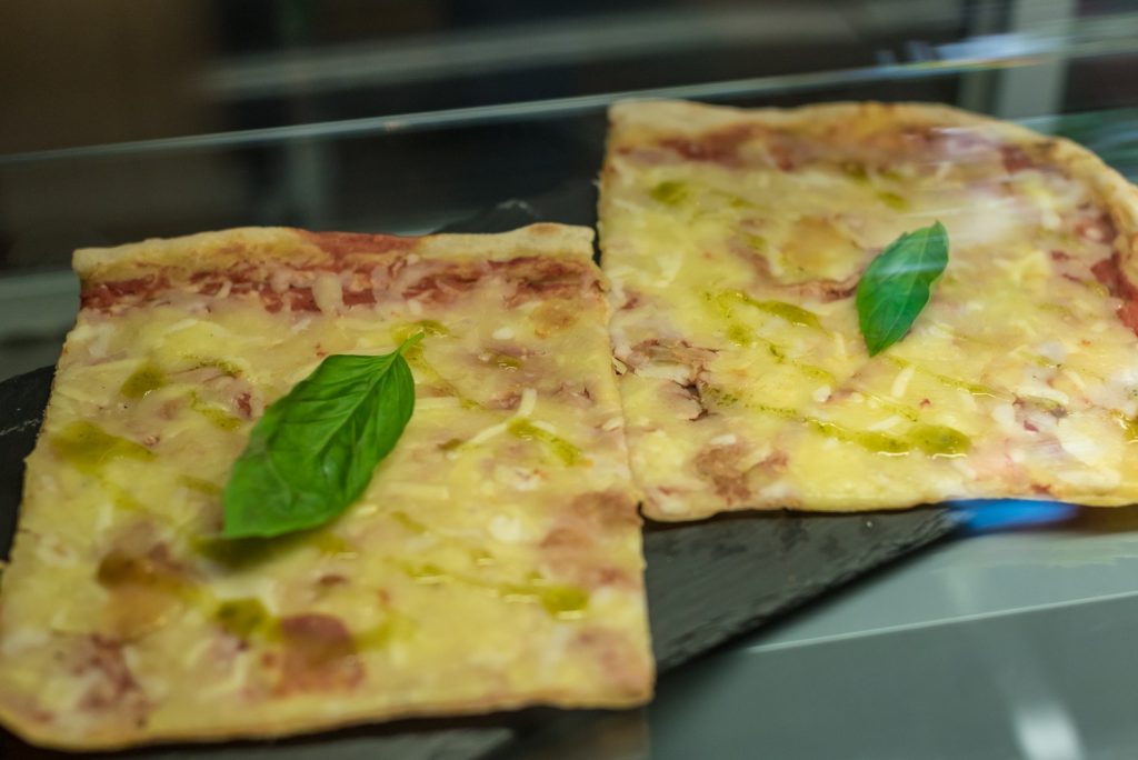 Tasty pizza slices in Aperitivo