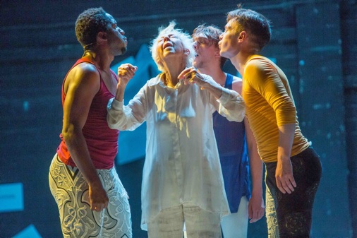 Lear standing with her three sons