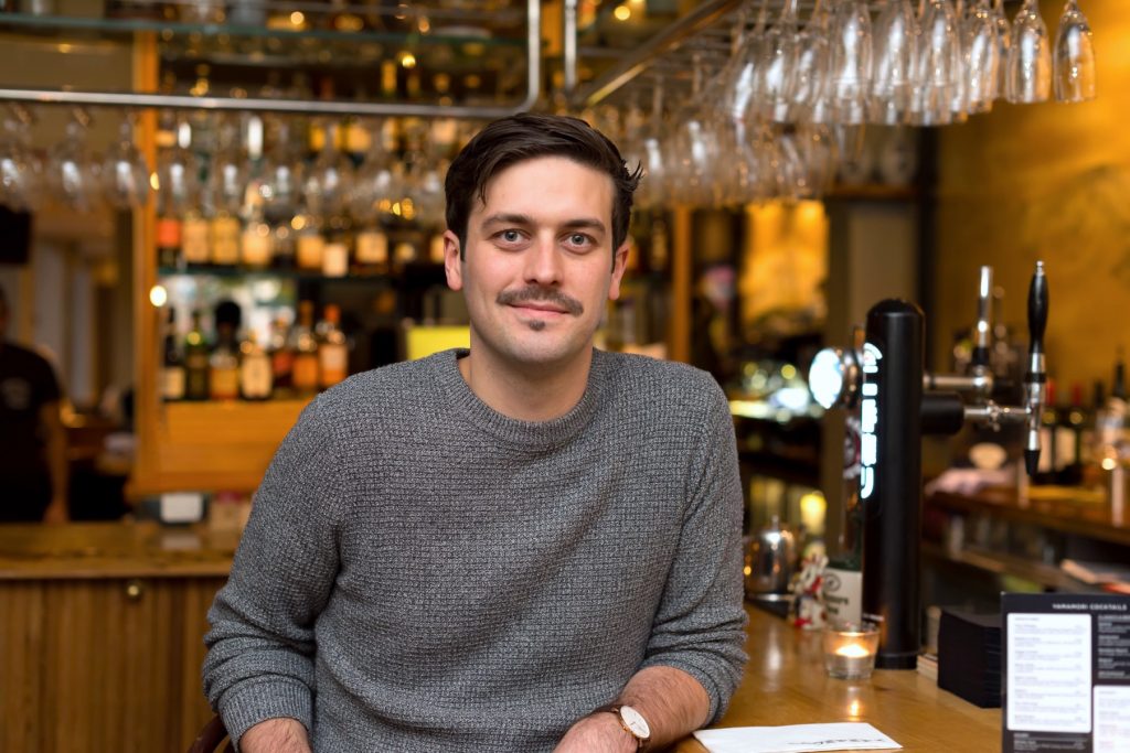 Graham Ryan, the general manager of Yamamori at the bar