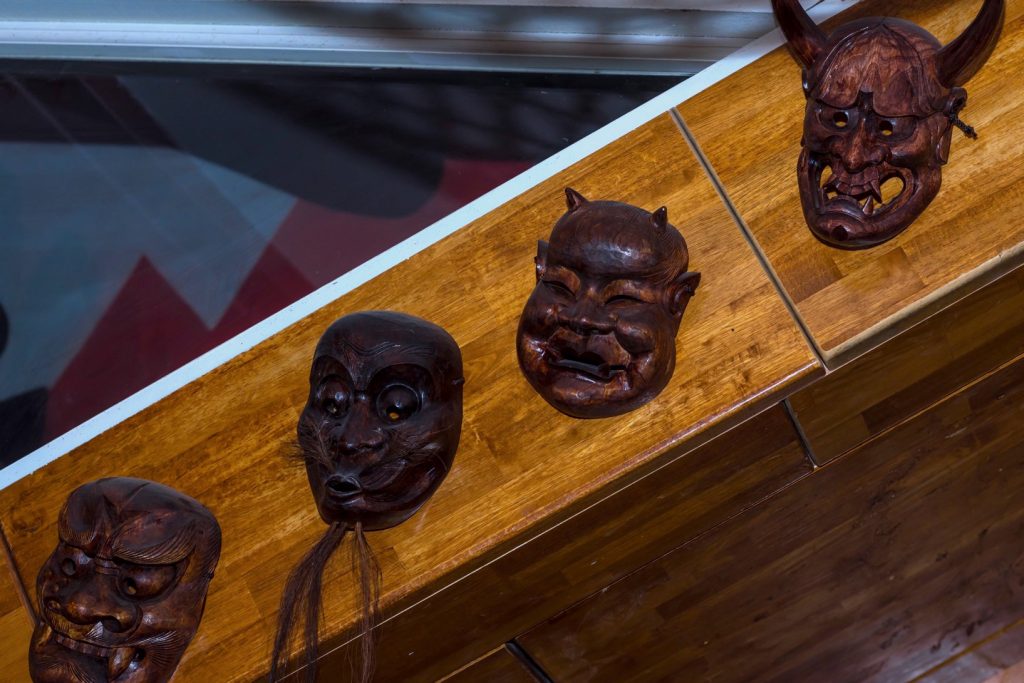 Wooden carved heads on a board from Yamamori Sushi, who's manager Graham Ryan we interviewed in this month's Amuse Bouche