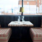 A table set with wine glasses at sophie's restaurant at the dean hotel for the November 2016 Amuse Bouche