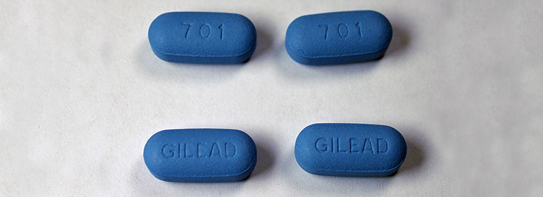 4 PrEP pills on a light coloured surface