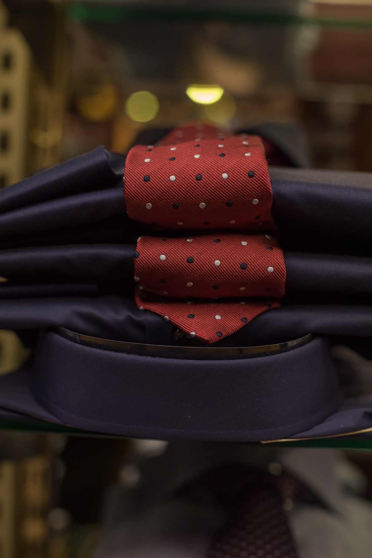 Shirts with ties at a Louis Copeland store