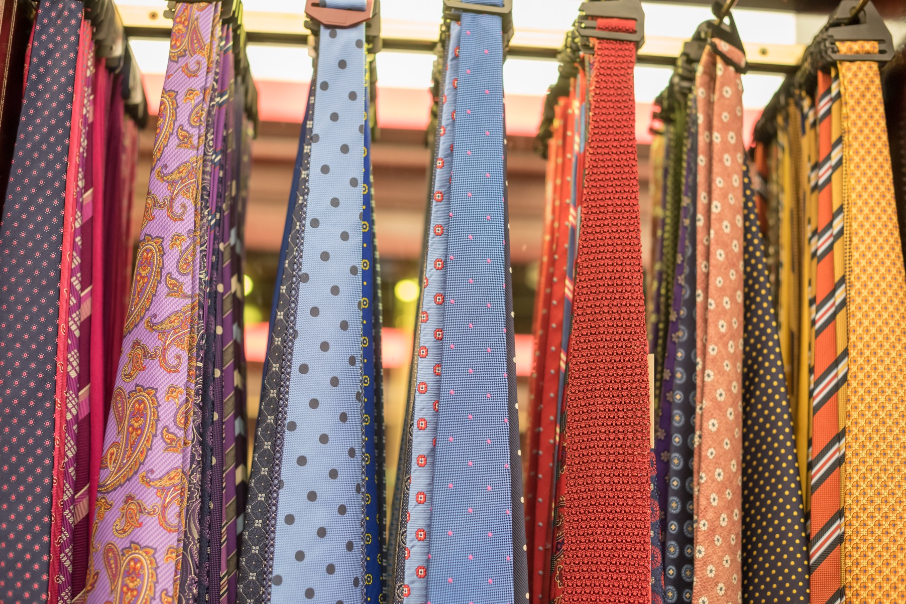 Ties on a rack at a Louis Copeland store