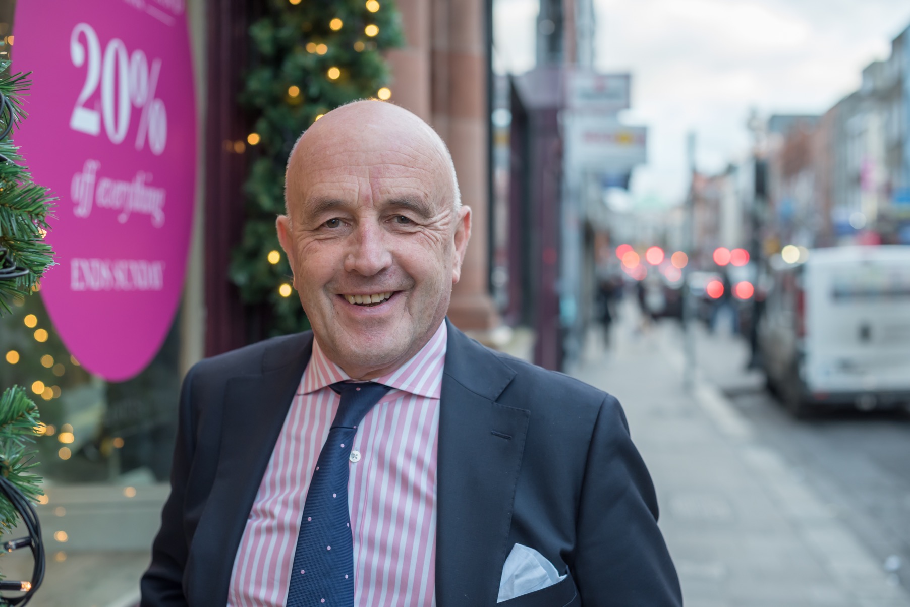 Louis Copland standing outside his store