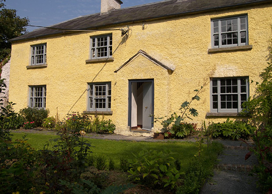 A yellow house which is one of the Irish Landmark Trust venues - the same Irish Landmark Trust who has a Valentine's Giveaway