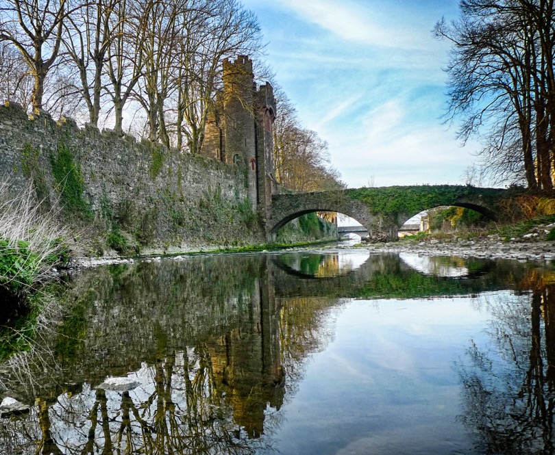 A castle and bridge over a river outside one of the Irish Landmark Trust venues - the same Irish Landmark Trust who has a Valentine's Giveaway