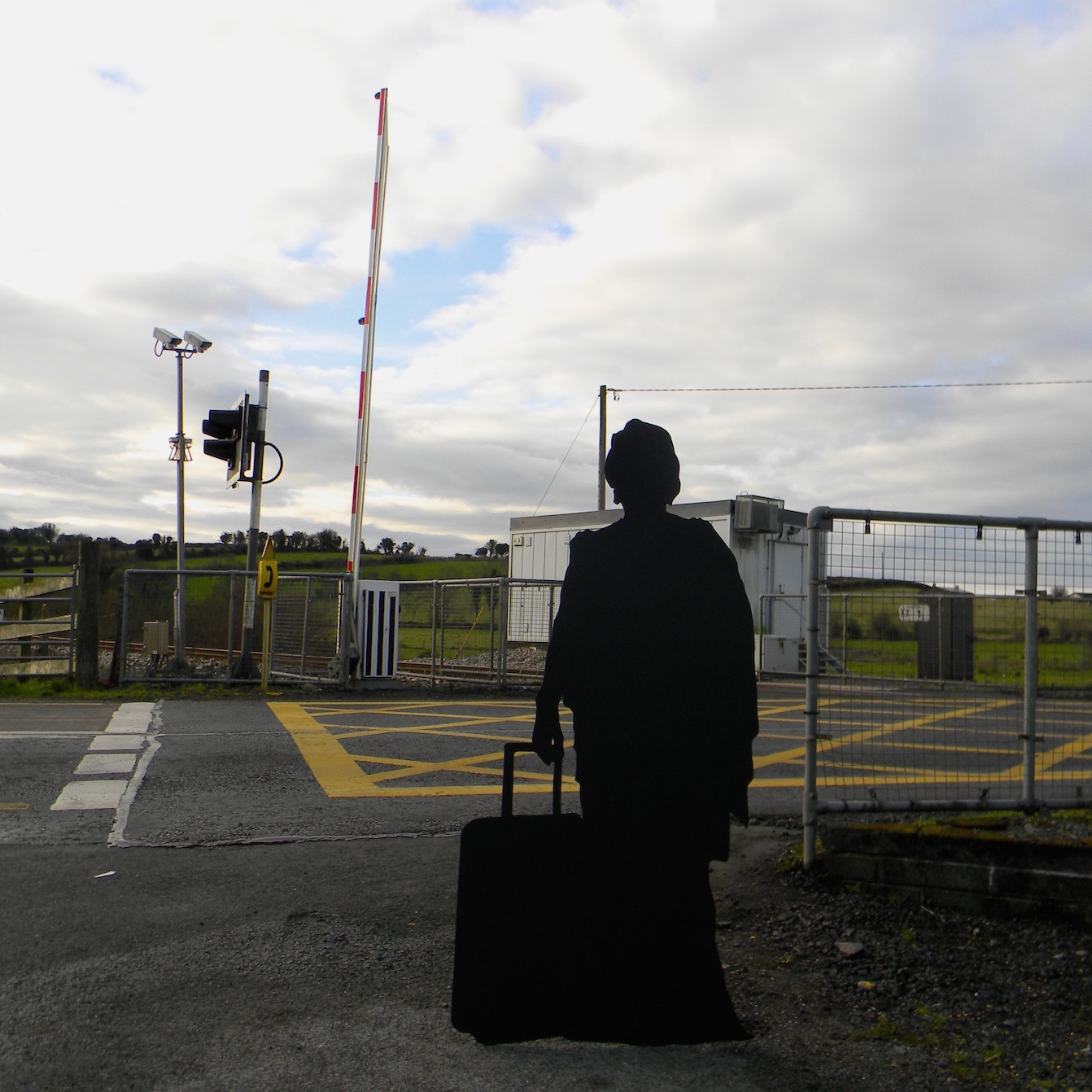 The silhouette of a woman with a suitcase as part of Will St Leger's Out of the shadows art project
