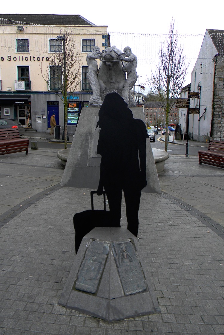 The silhouette of a woman with a suitcase as part of Will St Leger's Out of the shadows art project
