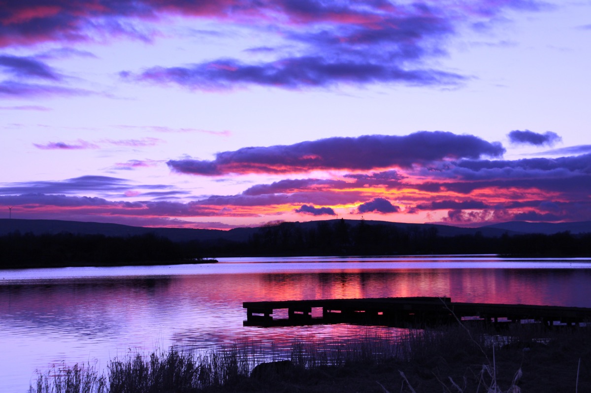 A beautiful pink sunset at Irish LGBT wedding venue, the watermill lodge