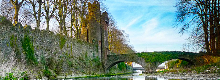 A castle and bridge over a river outside one of the Irish Landmark Trust venues - the same Irish Landmark Trust who has a Valentine's Giveaway