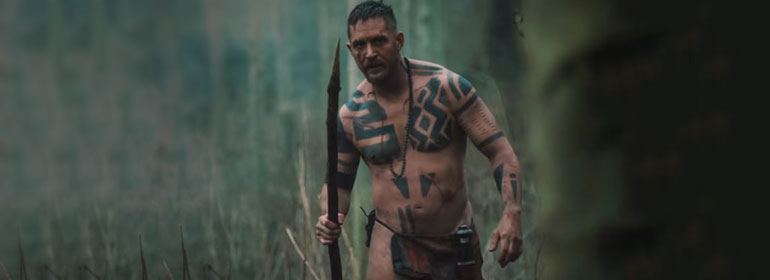 Tom hardy wearing only a loin cloth with tattoos on his body for today's Cuppán Gay