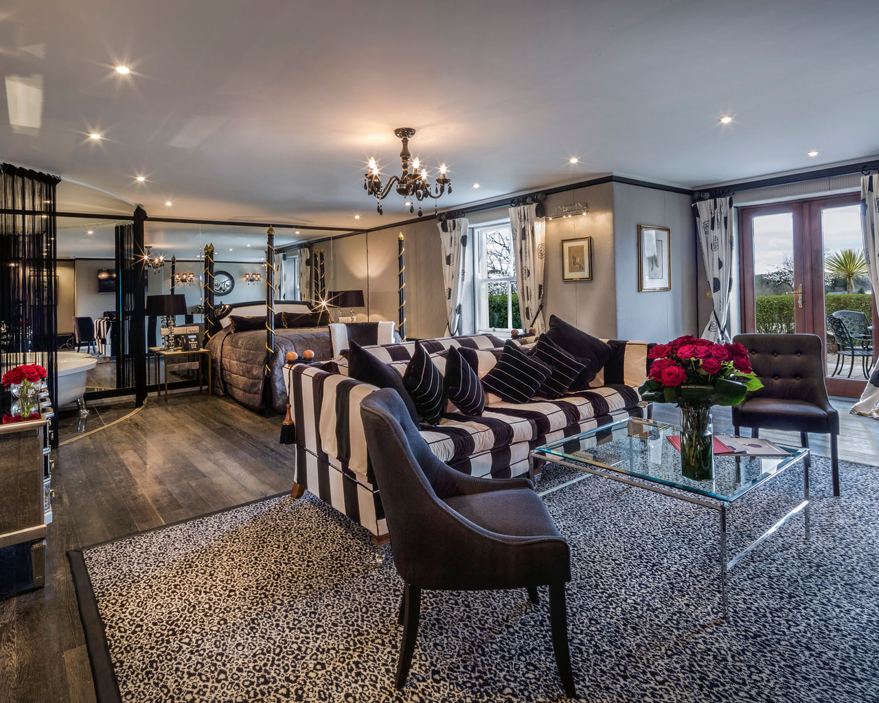 An interior shot of the lodge at ashford castle where if you book a wedding, you could win a luxury cruise to the value of e10000 with chairs and couches