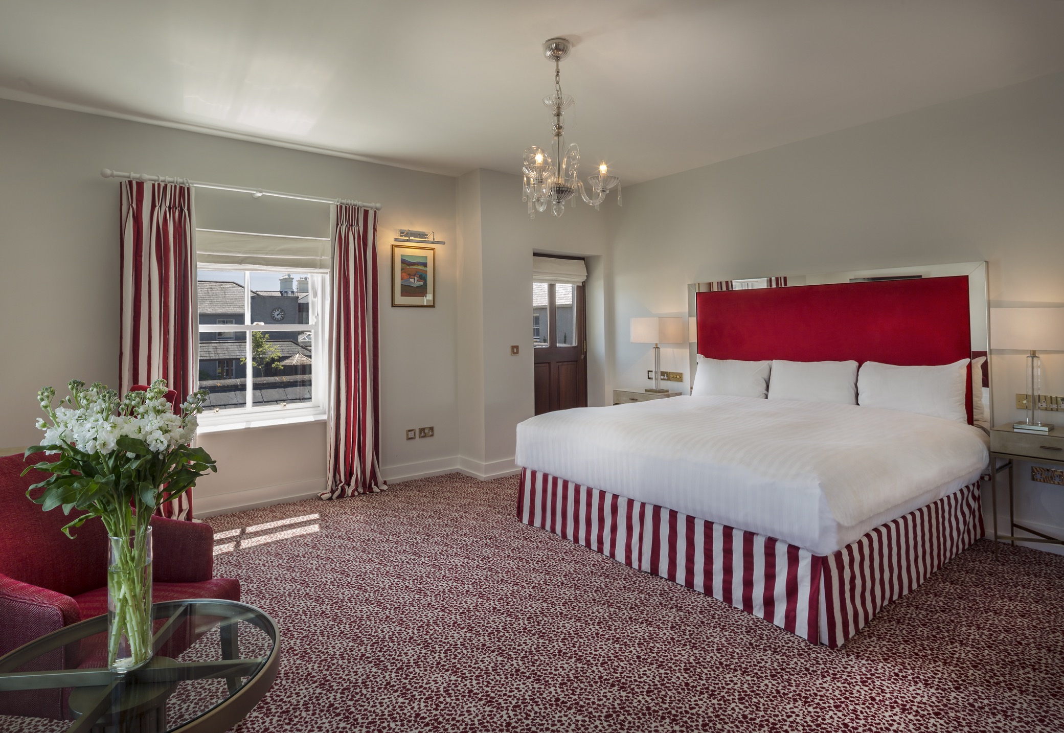 A modern looking hotel room at the lodge at ashford castle where if you book a wedding you could win a luxury cruise