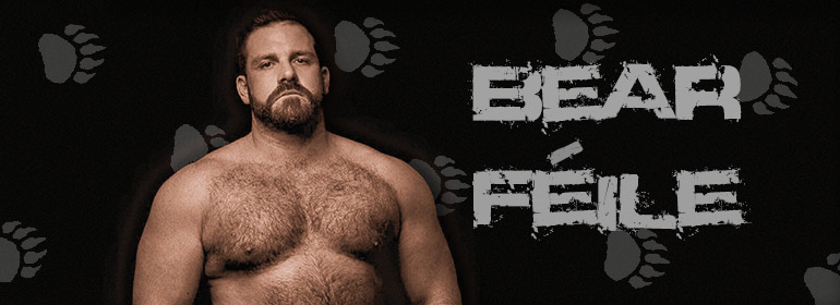 A gay bear with a hairy chest and the words Bear Féile written on top of paw prints