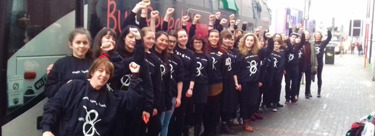 Women standing in front of the Bus 4 Repeal which handed out abortion pills to women who wanted them in Ireland