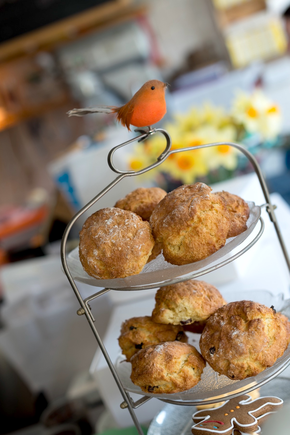 A shelf with scones at the cake cafe and slice which are both owned by Ray O'Neill