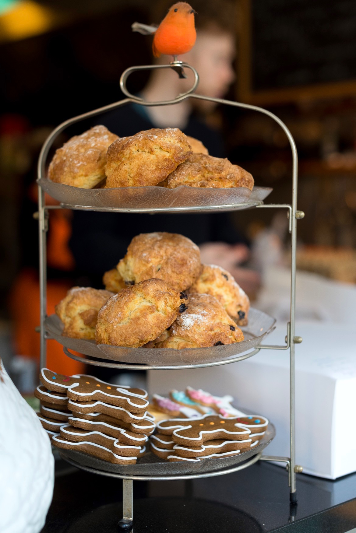 Scones and gingerbread men on a shelf at the cake cafe and slice which are both owned by Ray O'Neill