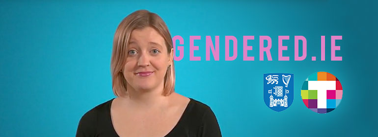 A woman in a video with a blue background and the words GenderEd.ie behind her which is the new trans support website launched by TCD and supported by TENI
