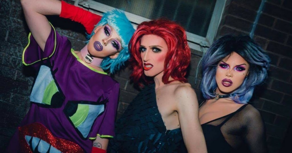 Drag Queens performers Veda and the witches posing for the camera