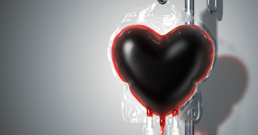 a blood bag shaped like a heart filled with blood