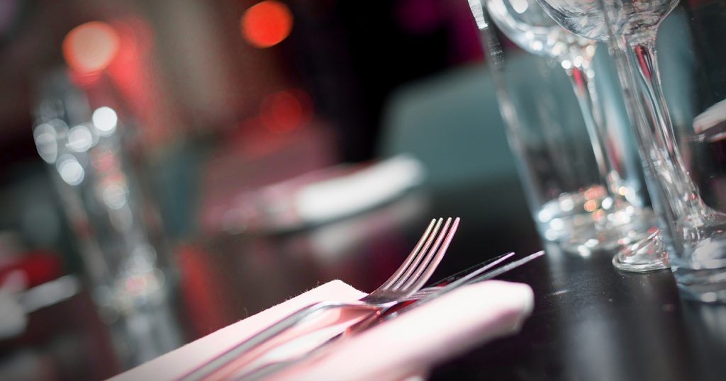 close up of tableware and glasses at bang