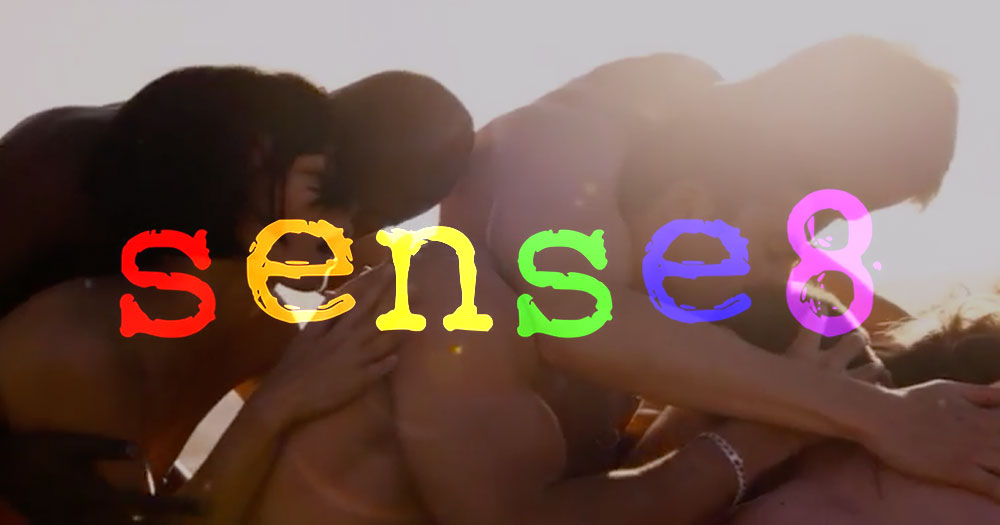 The sense8 cast in a sensual embrace with the show's logo over them