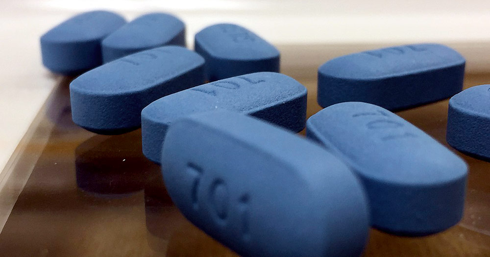 a picture of PrEP pills which are blue and have the number 701 written on them, the same drug that is manufactured by Gilead and known by it's name Truvada.