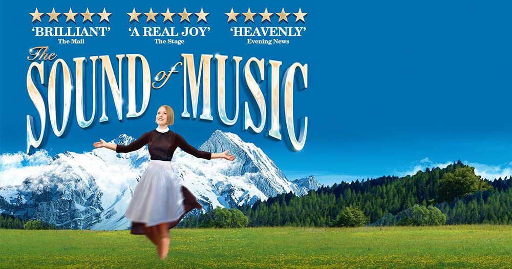 Poster of the sound of music. It shows Maria dancing through the Hills singing.