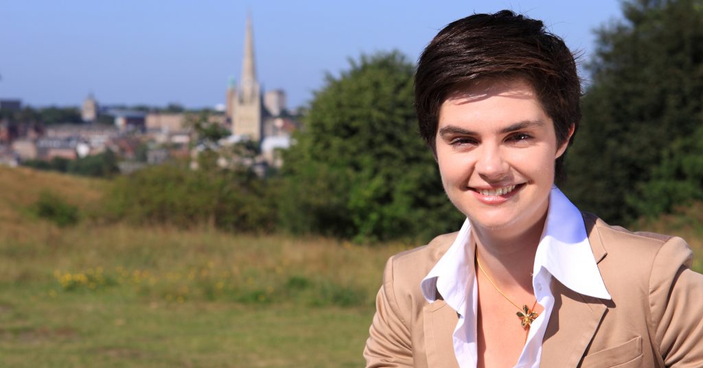 Politician Chloe Smith, who recently commented on same-sex marriage in Northern Ireland, smiling