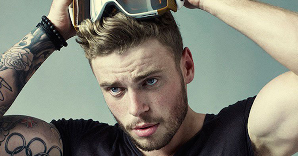 Gus Kenworthy, about to pull ski goggles over his eyes
