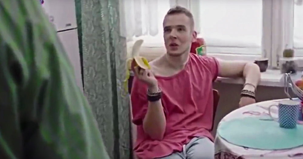 Russia releases video, pictured is a man in a pink t-shirt holding a banana
